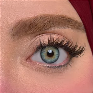 لنز چشم یونیک فصلی مدل BIE BL رنگ آبی سبز دوردار با مرکز عسلی
