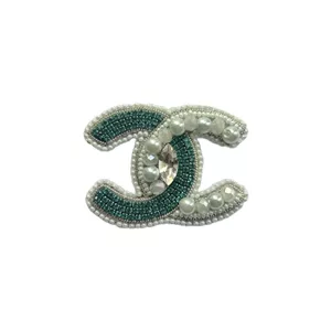 گل سینه زنانه مدل جواهردوزى