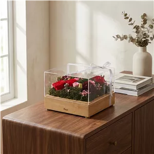 گل جاودان روبینا رز هلندی 5 شاخه رومیزی در باکس سوپرایزی، مناسب فضای باز و آپارتمانی، ماندگاری تا 3 سال، ابعاد 22×22×15 سانتی‌متر