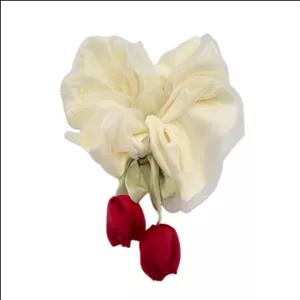 کش مو زنانه مدل آویز گل لاله