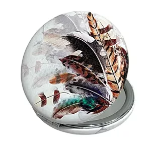 آینه جیبی مدل گرد طرح پر رویایی بوهو کد 8