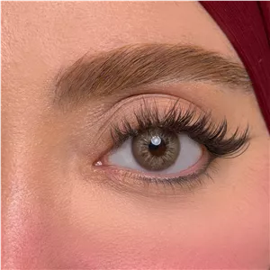 لنز چشم یونیک فصلی مدل BRZ رنگ عسلی رگه دار با دور قهوه ای