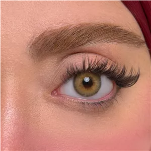 لنز چشم یونیک فصلی مدل CMEL رنگ عسلی کاراملی دوردار 