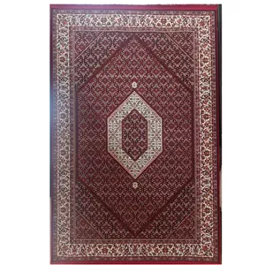 فرش ماشینی 500 شانه زمینه قرمز لاکی حاشیه زرشکی مدل طرح هریس آکریلیک 