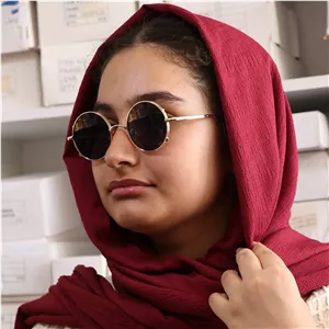 عینک دید در شب فانتزی کریستین دیور با فریم شکل گرد، رنگ مشکی و لنز قرمز رنگ مدل 2290