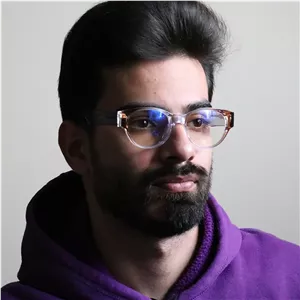 عینک بلوکنترل با فریم شکل بیضی، رنگ آبی و قهوه‌ای، دسته سیم‌دار، برند گوچی و لنز بلوکنترل کره‌ای برند SKY مدل 669802