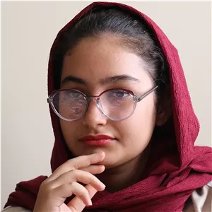 عینک زنانه با فریم سبز دو رنگ، شگل گرد و دایره‌ای، دسته سیم‌دار و لنز بلوکات و UV400 مدل 8329