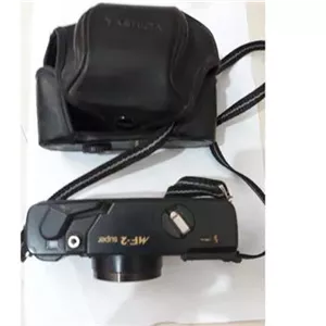 دوربین یاشیکا با کیف طبق عکس