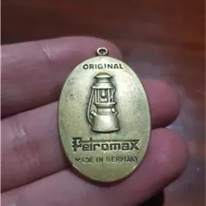نشان تبلیغاتی چراغ زنبوری پترومکس المان