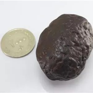 سنگ مشکوک به شهاب سنگ پوسته تاولی