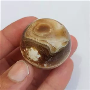 گوی 37 میلیمتری سنگ آراگونیت عسلی چشم ببری