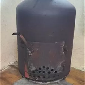 بخاری هیزمی آهنی دستساز