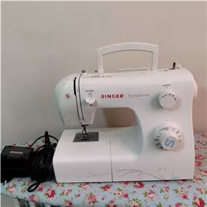چرخ خیاطی و گلدوزی سینگر
