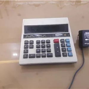 ماشین حساب لامپی با آداپتور SHARP