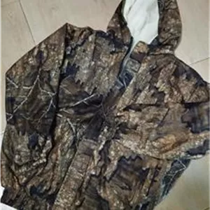 کاپشن طرح صخره ای یا تنه درختی استتار