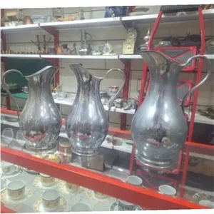 سه عدد پارچ برنجی قدیمی توضیح داره