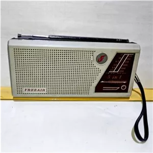 رادیو FREEAIR SWMW و فلاش لایت قدیمی