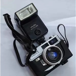 دوربین عکاسی minolta اصل ژاپن با کیف و فلاش فابریک