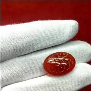 عقیق سرخ خطی 5تن با حکاکی استاد خسروی