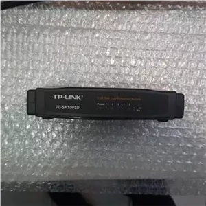 سوپیچ شبکه 10100TP-LINK tl-sf1005d و آداپتور 12V