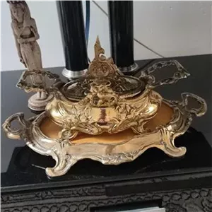 کشکول برنزی با سینه چرمی