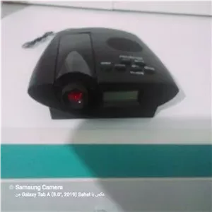 ساعت رومیزی رادیو دار و پروژکتوری (توضیحات دارد