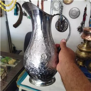 پارچ برنجی قدیمی قلم خورده