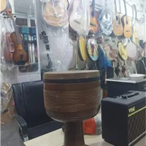 تنبک با چوپ گردو