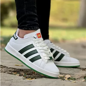 تخفیف باورنکردنی کفش کتونی مردانه و پسرانه مدل ونس لگو رنگ سفید سبز مناسب برای افراد خاص پسند رنگ سفید سبز باراسال رایگان