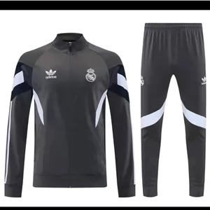 گرمکن شلوار طوسی تمام زیپ رئال مادرید 2026 با لوگو دوختی تایلندی