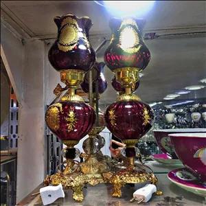 شمعدان لاله طلا کوب زرشکی پایه برنزی سایز کوچیک 45 سانت