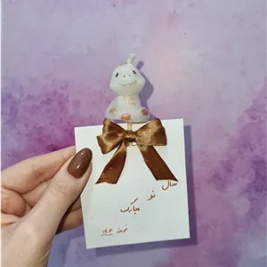 گیفت نوروزی هدیه نوروزی شمع دست ساز طرح مار سال جدید 1404 به صورت تک و عمده در رنگ بندی متنوع د دلخواه
