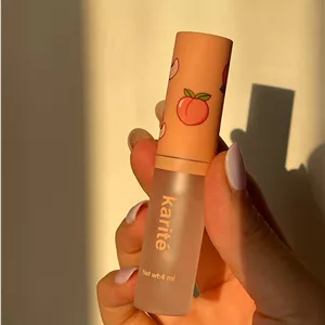 روغن لب مرطوب کننده هلو karite 🍑