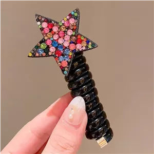 کش مو زنانه مدل فنری طرح ستاره کهکشانی صورتی