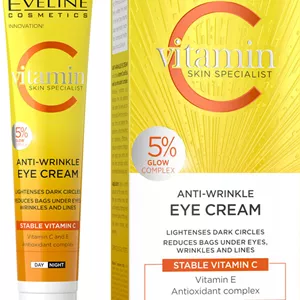 کرم دور چشم روز و شب حاوی ویتامین سی اولاین Eveline Skin Specialist Vitamin Anti-Wrinkle Eye Cream for Day and Night