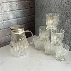 ست پارچ و لیوان پیرکس شیار دار درب استیل ۷ پارچه