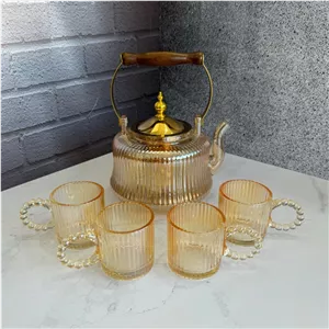 ست قوری و استکان پیرکس دسته منجوق شامپاینی
