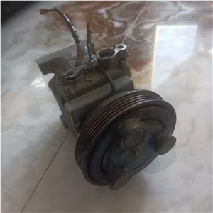 کمپرسور کولر مزدا 323 (فابریک پاناسونیک ژاپن کم کار در حد نو)