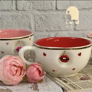 فنجان سرامیکی ( دستساز)مدل آویزدار لب قرمز