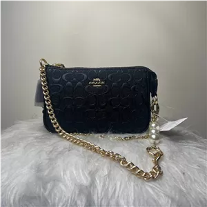 کیف دستی زنانه کوچ مدل Nolita 19 طرح چرم