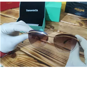 عینک تیفانی اورجینال قهوه ای بدون فریم عدسی نشکن