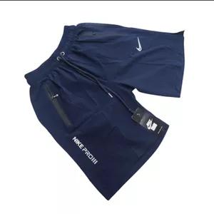 شلوارک ورزشی پسرانه (12 تا 18 سال) مدل NIKE پارچه آیرو خارجی (وارداتی) درجه یک جیب دار زیپ دار سبک و خنک