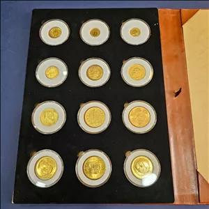 مجموعه سکه های نمونه اب طلا پهلوی دوم با البوم مخصوص وکپسول