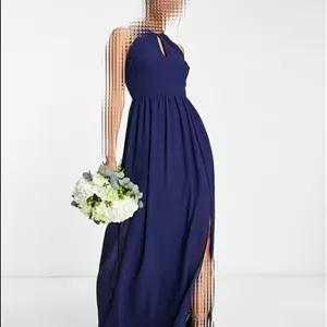 پیراهن زنانه ماکسی مجلسی سرمه ای کرپ حریر