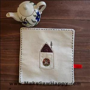 دستگیره آشپزخانه پارچه‌ای مدل مربع طرح آدمک در خانه رنگ سفید