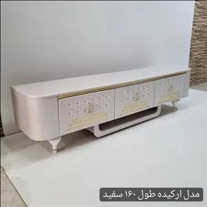 میز تلویزیون شبستان مدل ارکیده رنگ سفید مبلمان نارنجی مدل 528812