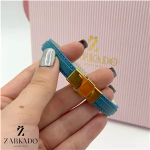 دستبند چرم و پلاک لیزر طلا با چرم آبی