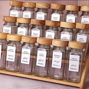 پک استند چوبی 18 تایی  18 عدد شیشه مک کارتی سایز ۲ با درب چوبی  18 عدد لیبل (چاپ سفارشی با هر اسمی که شما خواسته باشید)18 عدد سری نمک پاش