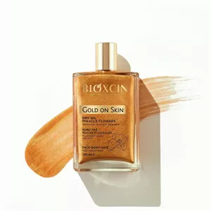 روغن مرطوب کننده و شاین پوست و مو بیوکسین مدل Gold On Skin - 100ml