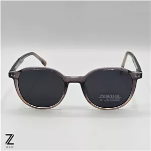 عینک آفتابی جنتل مانستر Gentle Monster پلاریزه و یونیسکس مشکی دودی شفاف/شامپاینی کد ۲۰۰۹